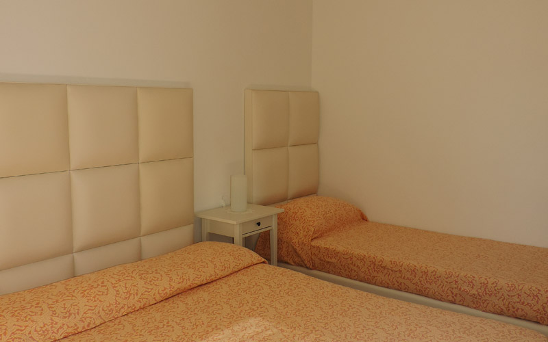 Camera da letto dell'appartamento Agapanto